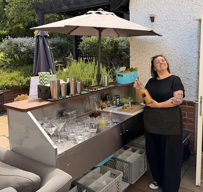 photo of bar staff performing set up for the mobile bar